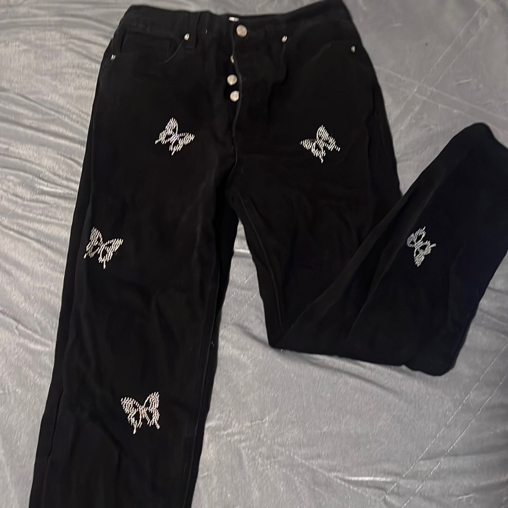 High rise black jeans with butterflies